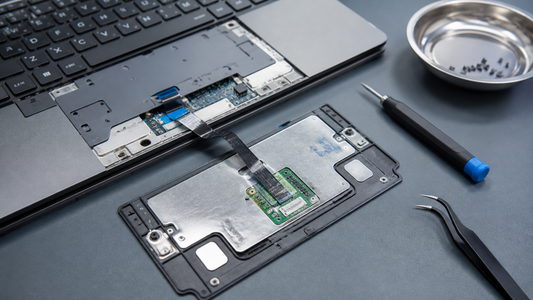 Simulated professional repair scene for Laptop Touchpad: Loose internal flex cable